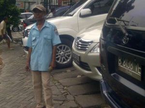 feature image Filosofi Tukang Parkir